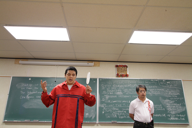 Giibwanisi (Anishinaabe Nation) and Chandu Claver (Igorot indigenous people, Cordillera, Philippines) Giibwanisi describes the significance of the eagle feather. Dr. Chandu Claver, to his left, is the Chairperson of BAYAN Canada. Photo by alex felipe (unedited) www.alexfelipe.info / www.alexfelipe.wordpress.com alexfelipe.photographer@gmail.com 