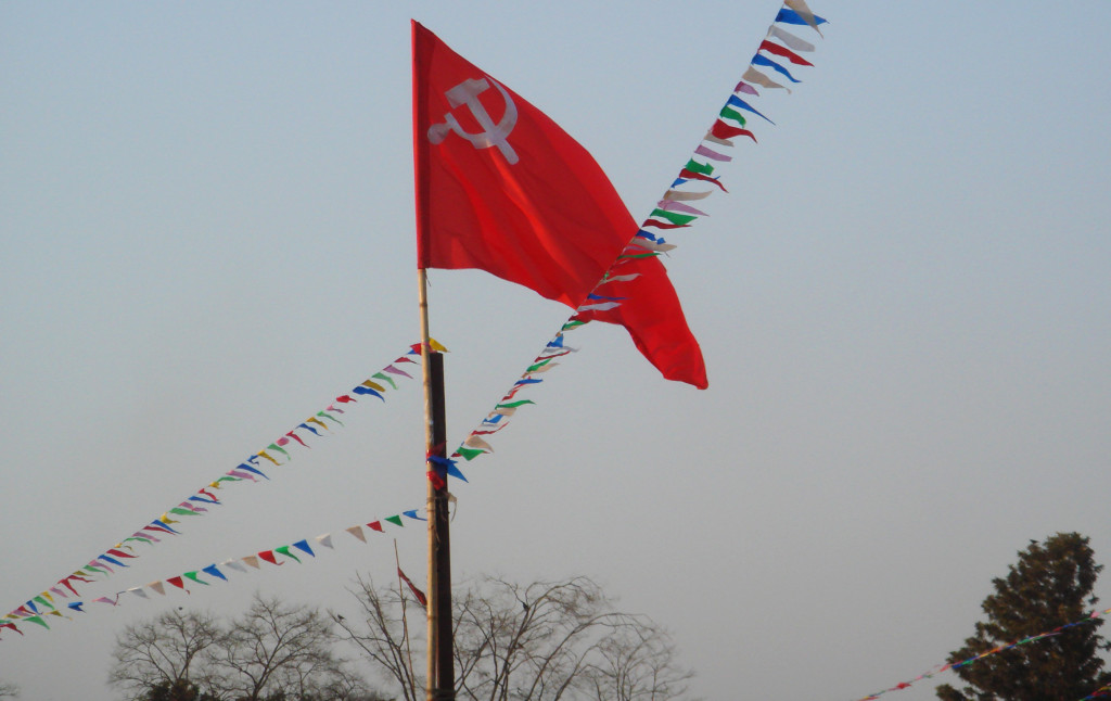 A communist flag flutters at the open session of the Seventh National Congress of the Communist Party of Nepal – Maoist, held on January 9, 2013 in Kathmandu. (Noaman G. Ali)