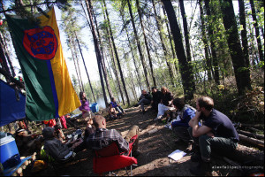 Morning meeting on the campsite, prepping jobs for the day