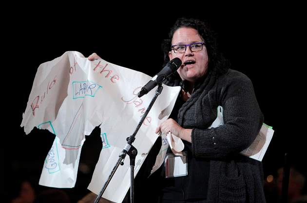 Kelly O'Sullivan, President of CUPE 4308, held up an image of a triangle encompassing labour, government, and capital, illustrating the postwar "social compromise". O'Sullivan asked the leadership why "labour is the only partner still playing by the rules" when capital and government have long ago abandoned the welfarist social contract.