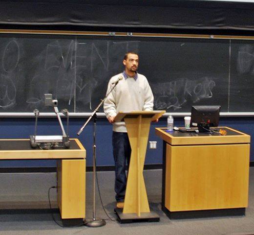 A photo of Ali speaking at the Arab Revolutions 2013 Conference at York University -